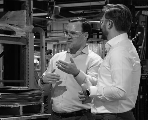 Southern Aluminum CEO Allison Schultz converses with Scott VandekerKerkhoff and Casey Yuhas of Saw Mill